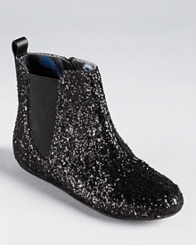 Slip-on sparkle - this on-trend ankle boot sports allover glitter and a zig-zag trim.