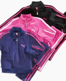 Keep it sporty. This streamlined velour track jacket and pants set from Puma is the perfect look to play in.