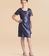 She'll shine like a disco ball in this slim-fitting, sequined shift dress.ScoopneckShort sleevesConcealed back zipperFully linedNylon/polyester/spandexDry cleanMade in the USA