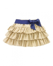 Rendered in lustrous woven cotton voile, a whimsical skirt features three tiers of cascading ruffles and a preppy grosgrain ribbon belt.