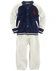 An essential preppy set combines an athletic-inspired hoodie and an athletic pant, both rendered in ultra-soft fleece.