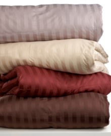 Everyday elegance. Bring a simple yet chic look to your space with this versatile comforter from Sealy, featuring a luxe landscape of tonal stripes in four color options. Finished with plush down fill, baffle box construction and 1 gusset.