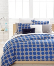 Sporty style meets preppy polish! This Serves duvet cover set from Lacoste dresses your bed with a landscape of mesmerizing circles. White piped edges complete the modern look. Button closure.