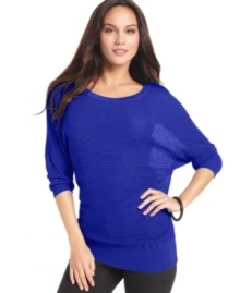 The season just got brighter with this chic open-knit sweater from Style&co. Airy dolman sleeves create a fashionably relaxed look, while an attached fitted camisole shapes your silhouette.