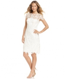 Patra's petite lace sheath dress is stunning with scalloped edges and sheer detail at the sleeves and chest. Makes a beautiful statement at special occasions and bridal celebrations!