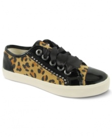 Fierce feet. A cheetah print on these Guess Louvre sneakers gives her feet a wild style.