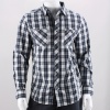 Go with the classic look of this plaid long sleeve woven; it goes great with anything! This men's shirt features a button front closure, long sleeves with button cuffs, all over plaid print & stitching detail. 100% Cotton. Machine Wash. Imported.