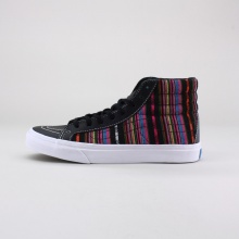 Strictly for the ladies, this is the Sk8-Hi Slim in a brand new Guate Stripe style. It lends the look of fine handmade textiles from distant shores in a slimmed done feminine look. Imported.