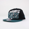 This men's snapback hat features a raised Eagles namesake across the front with the team logo on the right side. Authentic NFL merchandise. 100% Cotton. Do Not Wash. Imported.