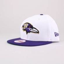 This snapback hat features a large raised Baltimore Ravens team logo at front, a stitched New Era® flag at wearer's left side, and an embroidered team namesake above the snapback closure. The inside is highlighted by branded taping and a moisture absorbing sweatband. One size fits most. 100% Cotton. Imported.