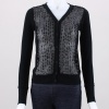 Update your style with the unique look of this cardigan from Poof! This soft women's knit cardigan features a button front, front mesh with sequin detail, and  ong sleeves with ribbed cuffs. 60% Cotton, 35% Rayon, 5% Spanded.