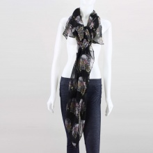 Get in touch with your rebelious side with this printed scarf! This scarf features soft lightweight knit with skulls and floral print throughout, and finished with stitching accent. 100% Viscose. Imported.