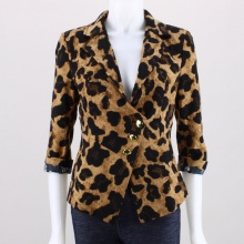 Set your outfit apart from the norm with this high fashion blazer and look like a style animal! This women's blazer features a safari print throughout, padded shoulders, 3/4 length sleeves, three-button front and contrasting printed liner. 100% Polyester. Hand wash. Imported.