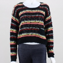 Get ready for the winter with this fun and flirty sweater. This loosely knitted woven top has a scoop neck, long sleeves and multi-colored accents. 100% acrylic. Machine wash. Imported.