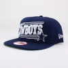 This 9FIFTY® cap features an embroidered (raised) Dallas Cowboys team namesake and logo with stripe accents at front, stitched New Era® flag at wearer's left side, and stitched alternate logo at wearer's right side. A snapback closure for an adjustable fit. Interior includes branded taping and a moisture absorbing sweatband. 100% Cotton. Imported.