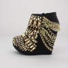 Give yourself a break from the normal and rock your fun vibe in these stunning wedge booties. Features shining geometric shaped studs upper, gold chain lingering around the heel, hidden platform, and wedge heel. Side zipper closure for easy on/off. Measures with a 5.25"  heel height and 2"  platform. Imported.