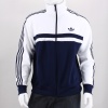 The men's adidas Originals Adi-Icon Track Top is the latest face of classic adidas athletic style. Showing off contrast colors and the iconic 3-Stripes on the sleeves, the jacket features zip-close pockets, a full zip and a stand-up collar. 87% Polyester, 13% Cotton. Machine Wash. Imported.