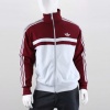 The men's adidas Originals Adi-Icon Track Top is the latest face of classic athletic style. Showing off contrast colors and the iconic 3-Stripes on the sleeves, the jacket features zip-close pockets, a full zip and a stand-up collar. 87% polyester, 13% cotton - imported.