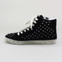 Studs on shoes are a simple way to spice up any outfit. It’s biker-chic without being too rough.  This classic high-top sneaker by Steve Madden takes a fashionable turn with stylish side zipper design. TWYNKLE look great with a pair of Boyfriend jeans and a simple tee. Imported.