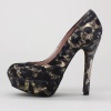 Take your sassy " Divah"  style to new heights with this platform pump from Betsey Johnson.