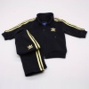 Even kids can appreciate the timeless style of this adidas Originals Firebird Track Suit. The authentic track suit silhouette is sized just for little ones, and is made of soft cotton terry for cruising comfort.