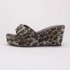 Platform sandals are the rage and these feature a sexy spotted print. Pick up yours today.