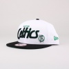 This snapback hat features a raised Boston Celtics text logo at front, a stitched New Era® flag at wearer's left side, and an embroidered nbat the wearer's right side. One size fits most. 100% Cotton. Imported.