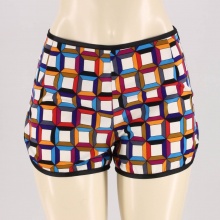 These vintage-inspired shorts featurea bright cubist print.