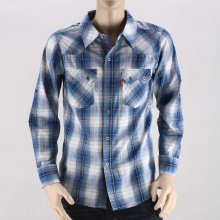 This classic, long-sleeved Boys' Western shirt is defined by sawtooth pockets, a front yoke and curved hem.