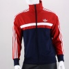 The men's adidas Originals Adi-Icon Track Top is the latest face of classic athletic style. Showing off contrast colors and the iconic 3-Stripes on the sleeves, the jacket features zip-close pockets, a full zip and a stand-up collar. 87% Polyester, 13% Cotton. Machine wash. Imported.