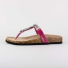 Mixing an old style bottom with a new style top, this molded footbed sandal features metallic and beaded detail.