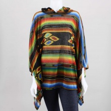 Stay cozy and chic in this tribal printed knit poncho. Featuring a lightweight semi-sheer knit with multi-colored print throughout, attached hood, draped sides, and finished with an oversized cut. 100% Polyester. Made in USA.