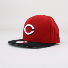 This 9FIFTY™ Strapback cap features an embroidered (raised) Cincinnati Reds namesake at front, a stitched New Era® flag at wearer's left side, secondary logo at wearer's right side, and a strapback closure for an adjustable fit. Interior includes branded taping and a moisture absorbing sweatband. 100% polyester. Do not wash. Imported.